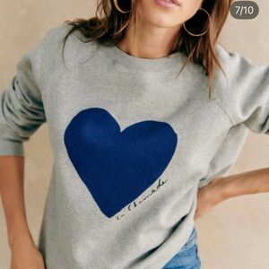 Sézane La Chamade”sweatshirt, features a bold navy heart.